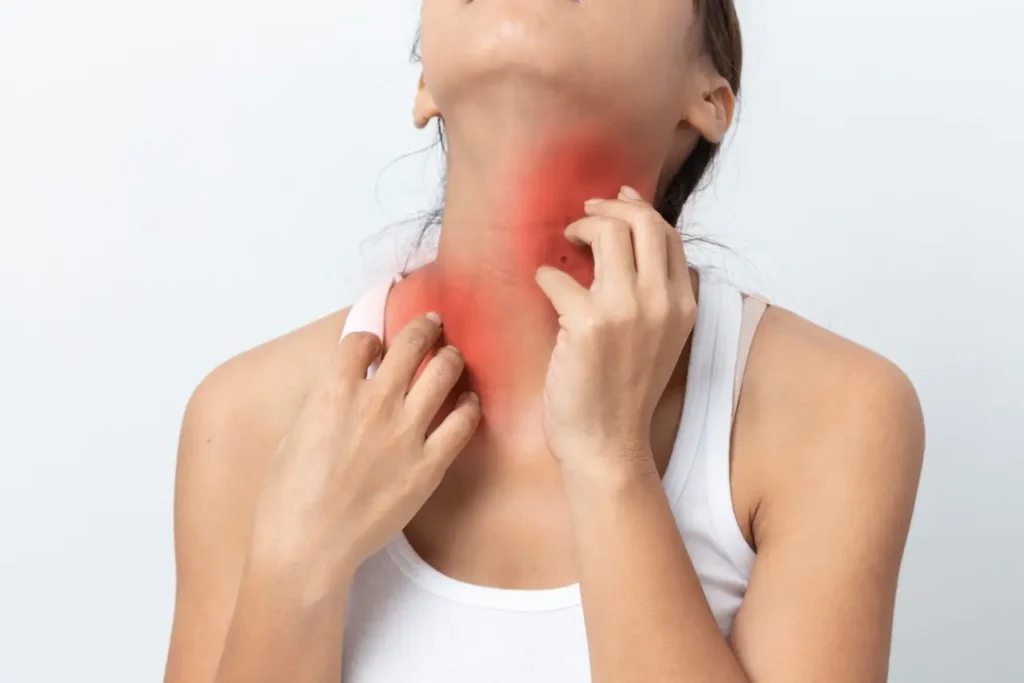 asian young Woman itchy skin scratching her neck Isolated on white background.